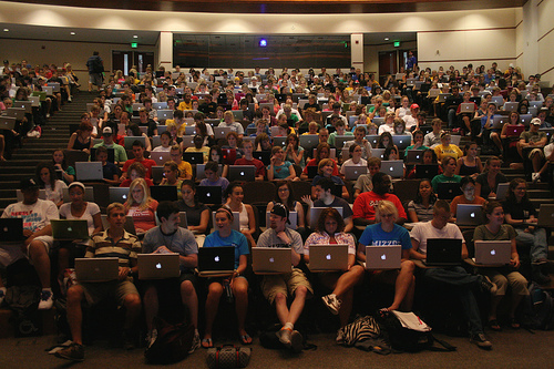 College Students with Apple Macbooks College Students with Apple Macbooks