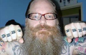 Debt Free Knuckle Tattoo