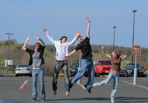 These happy teenagers need to learn to use credit responsibly